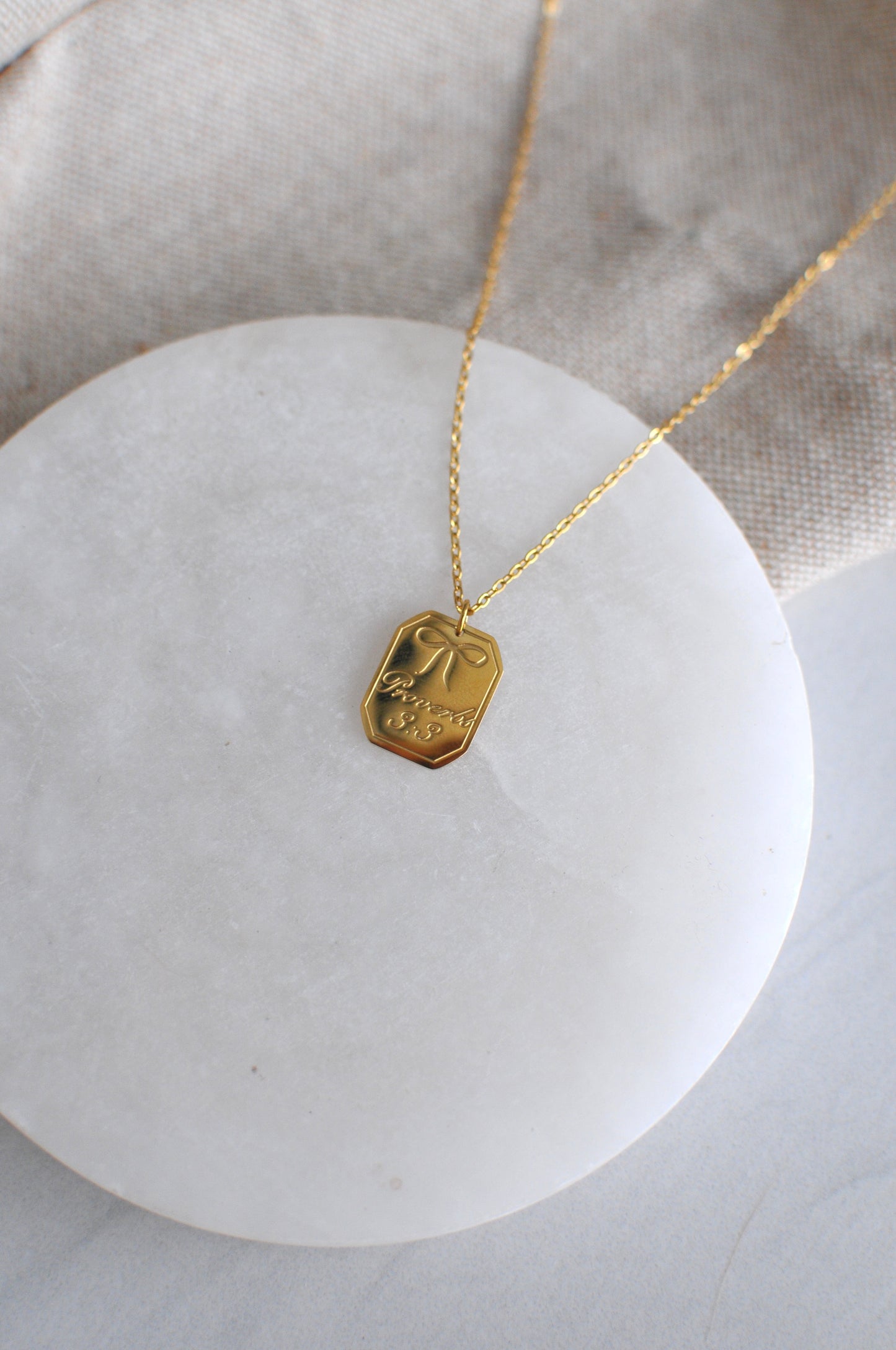Proverbs 3:3 Bow Necklace